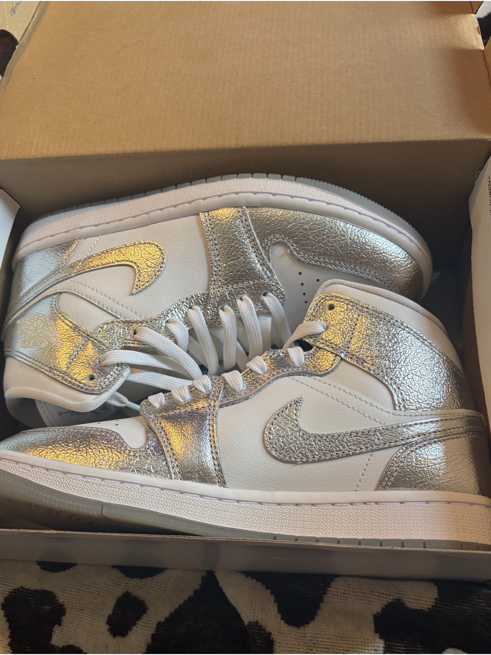 Jordan Women's High-Top Sneakers in Metallic Silver and White